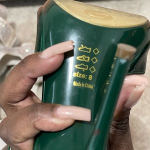 Green heels size 8 only worn once.  Great shape.